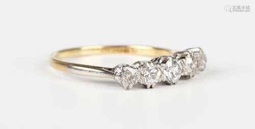 A gold and platinum diamond five stone ring, mounted with a ...