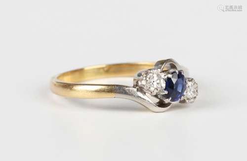 A gold, platinum, sapphire and diamond three stone ring, cla...