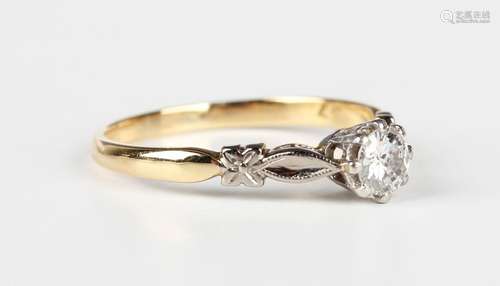 A gold, platinum and diamond single stone ring, claw set wit...