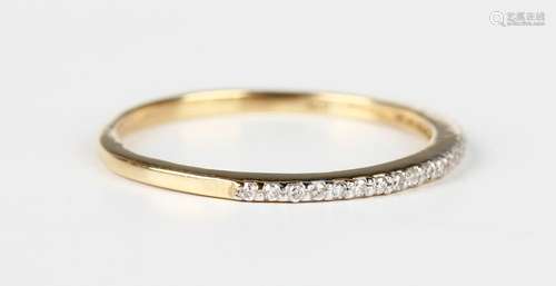 An 18ct gold and diamond half eternity ring, mounted with a ...