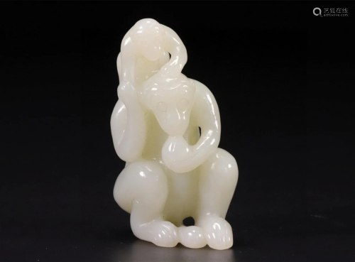 A Chinese Carved Jade Monkey Pendant