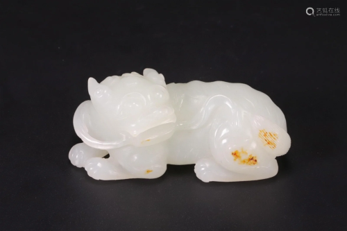 A Chinese Carved Jade Foo-Dog Pendant