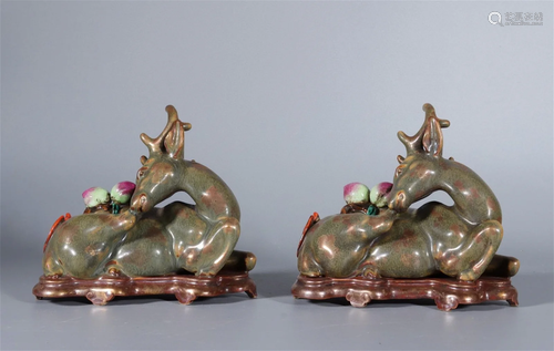 A Pair of Chinese Tea-Dust Glazed Porcelain Deer Decorations