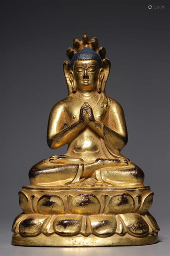 A Chinese Gilt Bronze Figure of Buddha