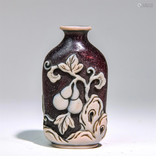 A Chinese Carved Peking Glass Snuff Bottle