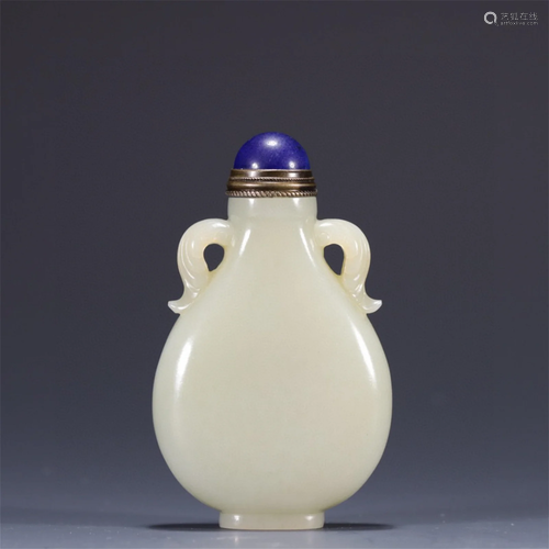 A Chinese Carved Jade Snuff Bottle