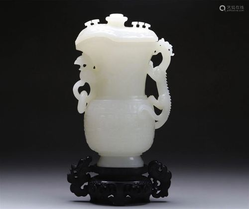 A Chinese Carved Jade Cup with Hardwood Stand