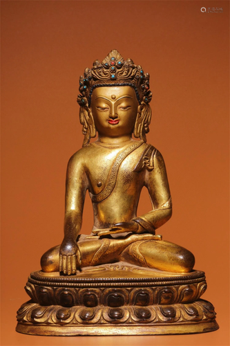 A Chinese Gilt Bronze Figure of Buddha