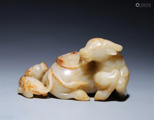 A Chinese Carved Jade Bull Decoration