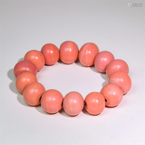 A Chinese Carved Coral-Red Peking Glass Prayers Beads