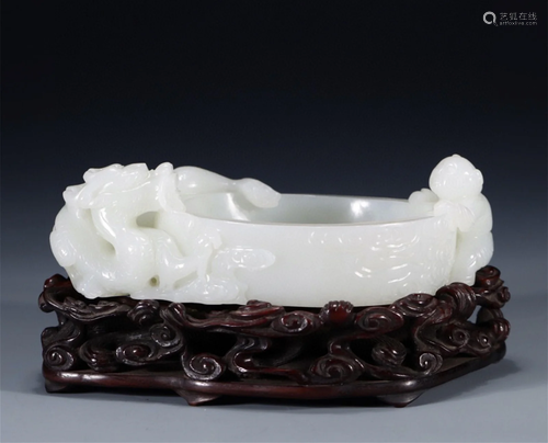 A Chinese Carved Jade Brush Pot with Hardwood Stand