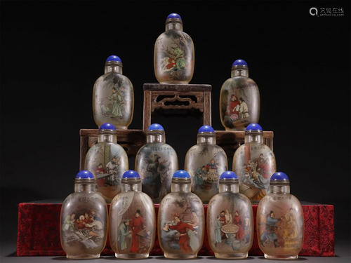 A Set of Twelve Chinese Carved Peking Glass Snuff Bottles