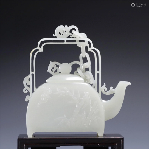 A Chinese Carved Jade Wine Pot with Handle