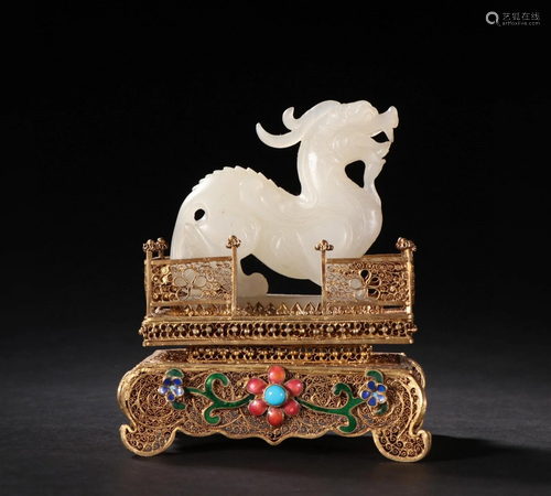 A Chinese Carved Jade Dragon with Gilt Silver Stand