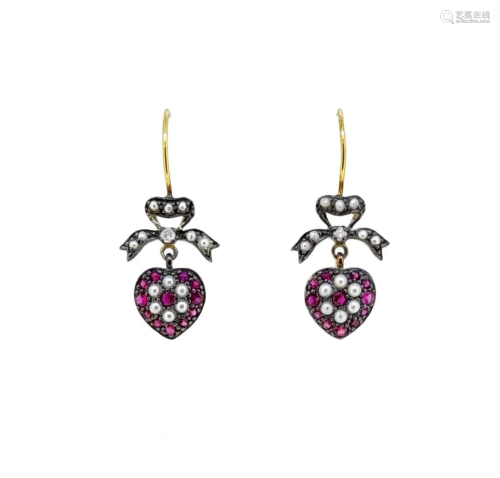 A pair of ruby and diamond heart shaped ear pendants,
