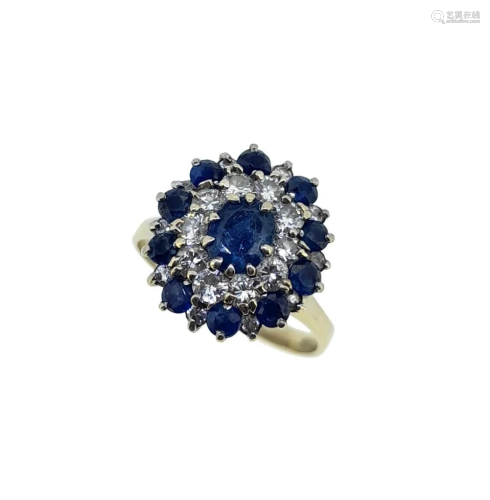 A late 20th century sapphire and diamond cluster ring,