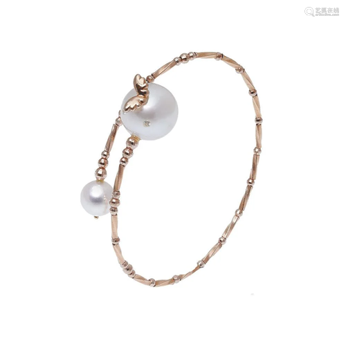 A south sea and akoya cultured pearl bangle,