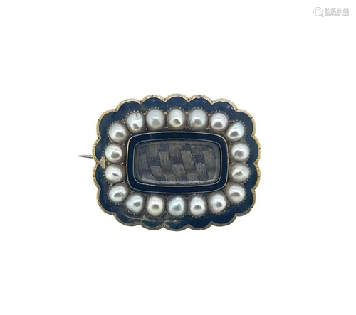 An early 19th century pearl and enamel mourning brooch,