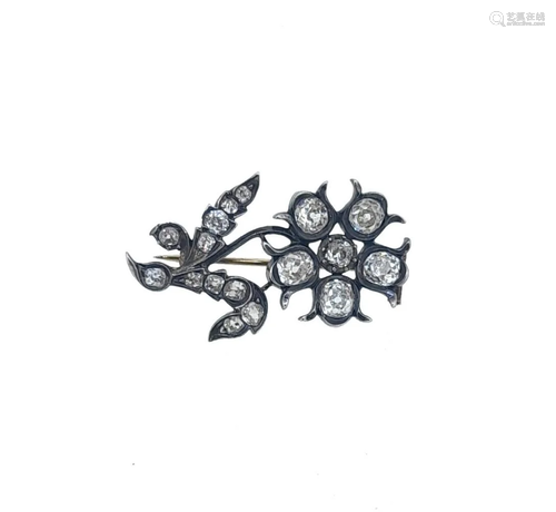 A Victorian diamond set flower brooch,