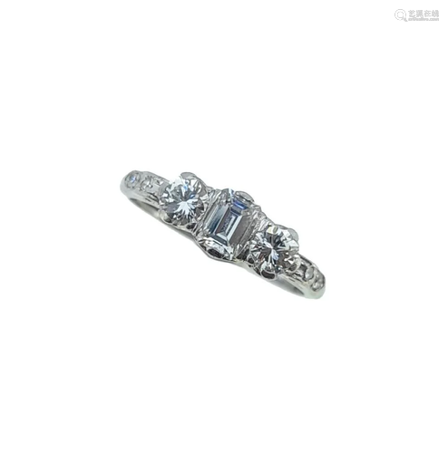 A modern three stone diamond ring,