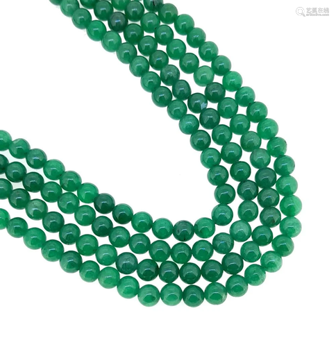 An emerald bead necklace,