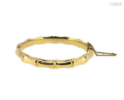 A 9ct gold bamboo style hinged bangle,