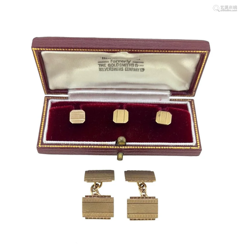 A near set of cufflinks and dress studs,