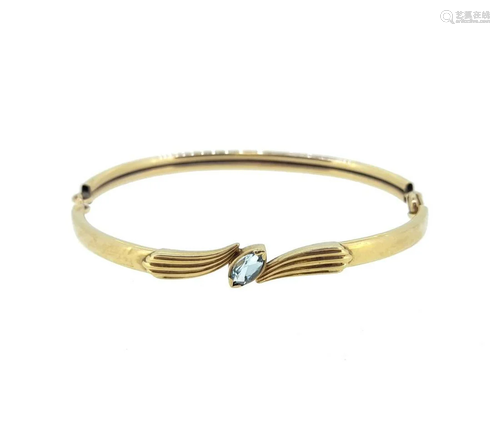 An aquamarine hinged bangle,