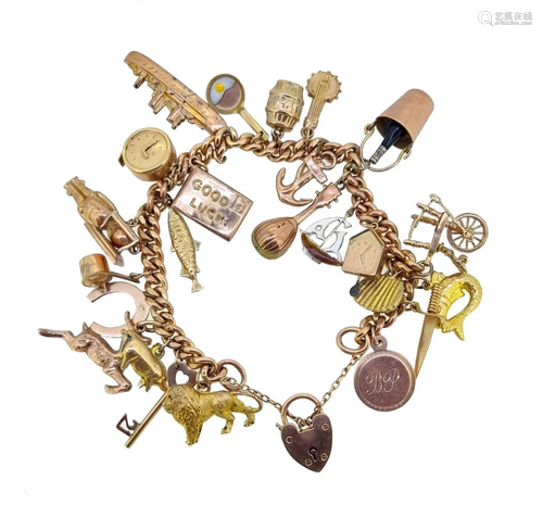 A 9ct gold charm bracelet with assorted charms,