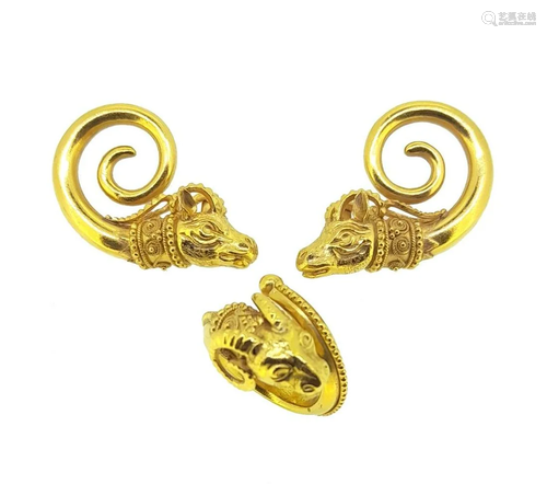 A modern ram's head ring, together with matching ear cl...