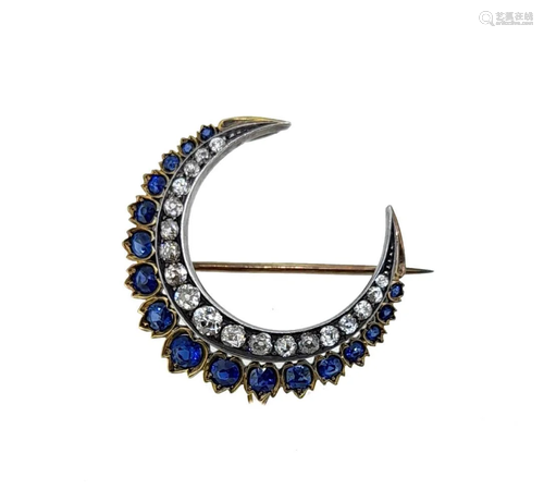 A sapphire and diamond crescent brooch,