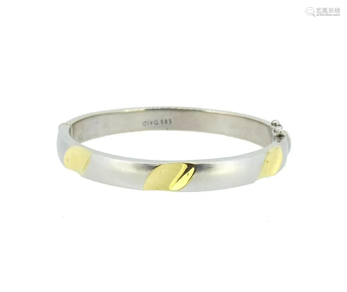 A two colour hinged bangle,