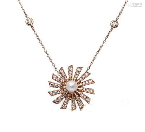 A cultured pearl and diamond spinning pendant,