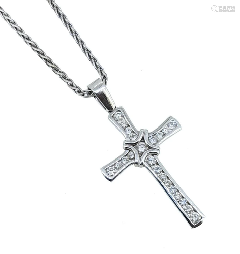 A diamond cross pendant and chain,