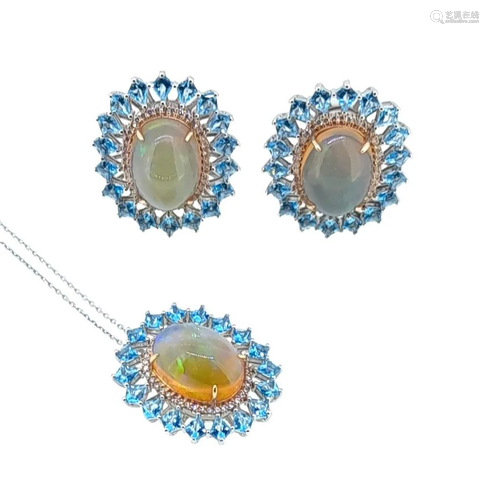 An opal and topaz pendant with matching ear studs,