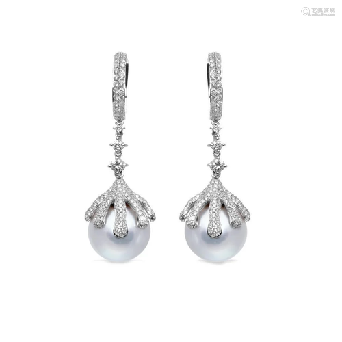 A pair of south sea cultured pearl and diamond ear pendants,