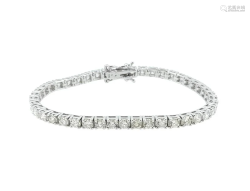 A diamond set line bracelet,