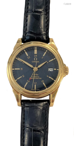 Omega - A Swiss 18ct gold 'De Ville GMT Co-Axial' ...