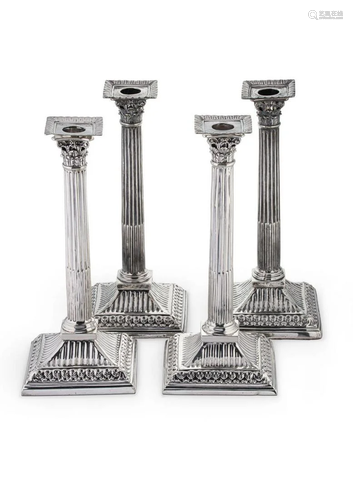 A harlequin set of 4 George II silver candlesticks,