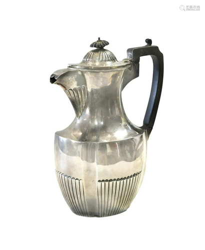 An Edward VII silver hot water jug,