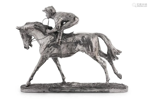 A 20th century silver model of a galloping horse and jockey,