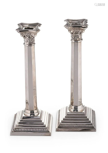 A pair of mid 20th century silver candlesticks,