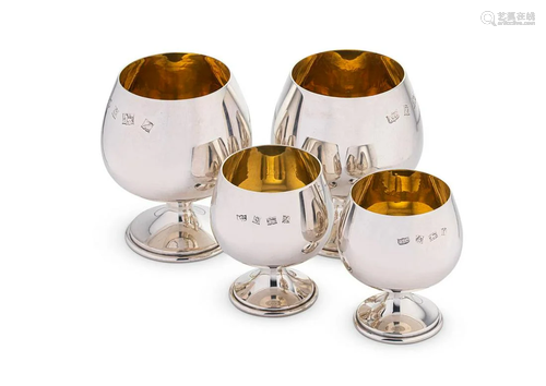 Two pairs of mid 20th century silver brandy snifters,