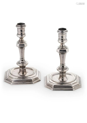 A pair of mid 20th century cast silver candlesticks,