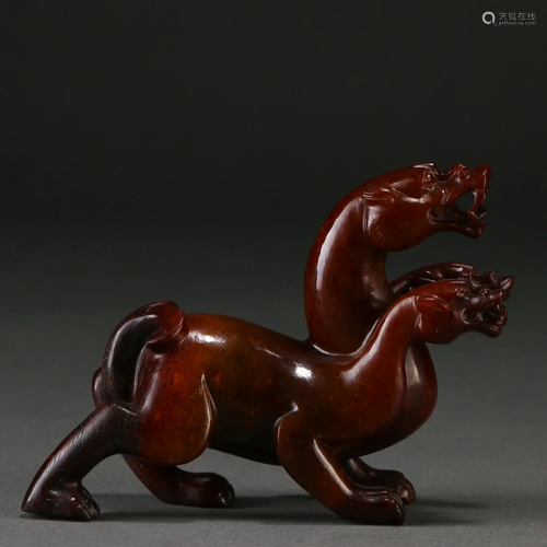 A Chinese Carved Jade Mythical Beast