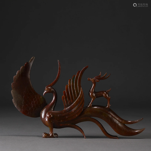 A Chinese Carved Jade Phoenix