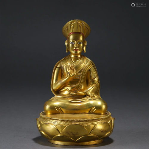 A Tibetan Bronze-gilt Figure of Master