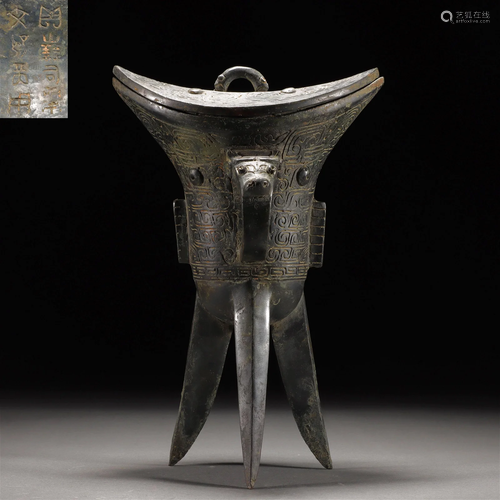 A Chinese Bronze Wine Vessel Jue