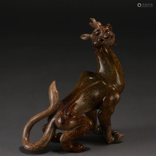 A Chinese Carved Jade Mythical Beast