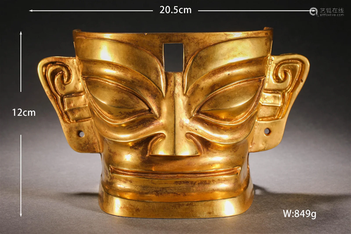 A Chinese Bronze-gilt Mythical Humanoid Mask